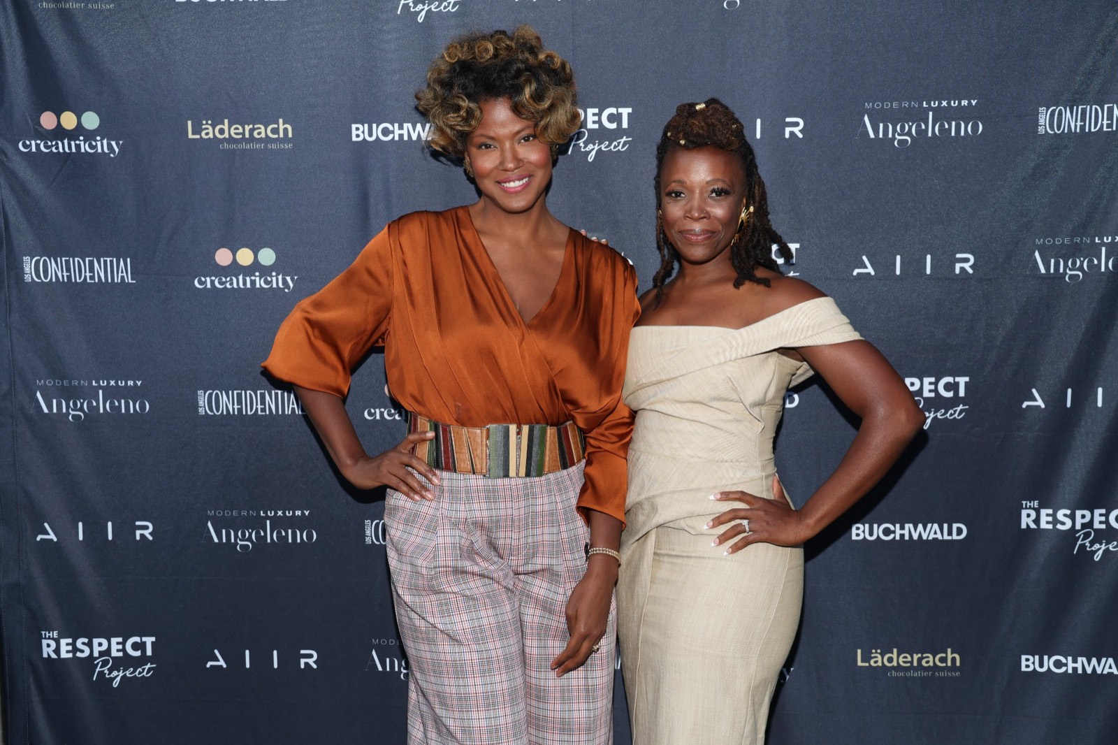 Guests on the step-and-repeat at a Creatricity partner event