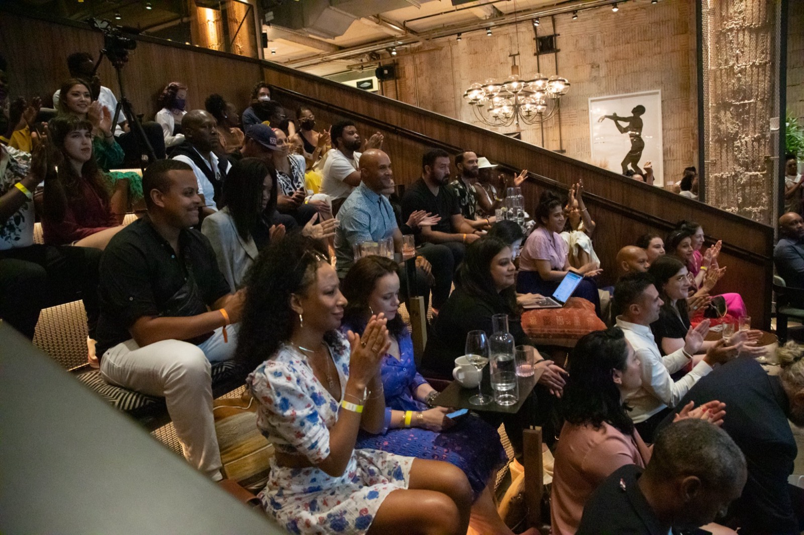 A packed room of attendees at a Creatricity event