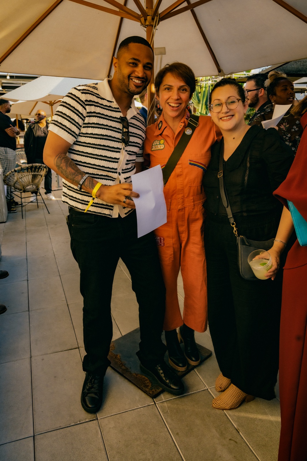 Guests gathered arm in arm at a Creatricity event